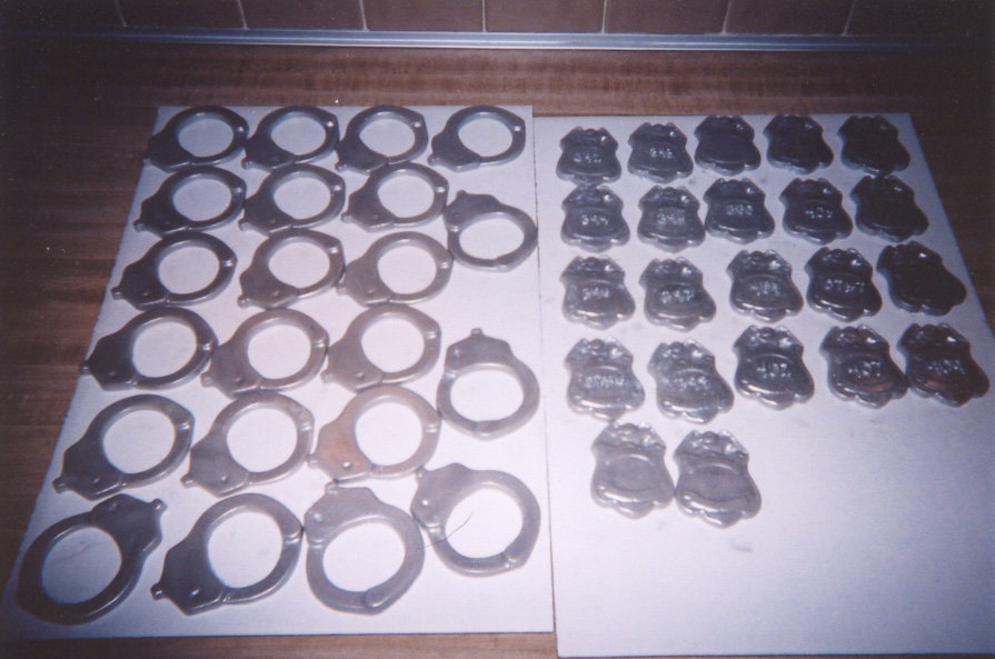 Hand cuffs and badges
